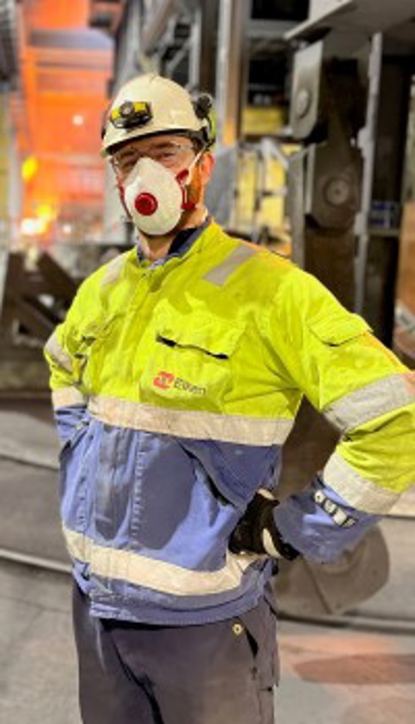 Blog writer Mats wearing helmet, work overalls and respiratory protection.